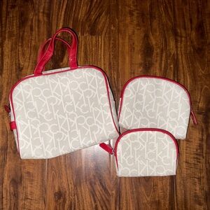 Calvin Klein Stylish Travel Bag Set with Red Handles